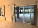 Spacious living room with sliding glass doors leading to outdoor space at 417 Lake Butler Dr, Kissimmee, FL 34759
