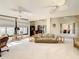 Open living area showcases multiple ceiling fans, lots of light and neutral decor at 417 Lake Butler Dr, Kissimmee, FL 34759