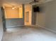 Carpeted loft area with vaulted ceiling, fan, and tv at 417 Lake Butler Dr, Kissimmee, FL 34759