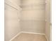 Empty walk-in closet with multiple wire shelves for organizing clothes, shoes, and accessories at 417 Lake Butler Dr, Kissimmee, FL 34759