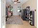 Versatile bonus room with tile flooring, ample natural light, and space for multiple uses at 11213 Se 53Rd Ct, Belleview, FL 34420