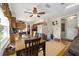 Open dining area seamlessly connected to the kitchen, perfect for Gathering meals and gatherings at 11213 Se 53Rd Ct, Belleview, FL 34420