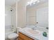 Bathroom featuring a tub-shower combo, light walls, and a single vanity at 536 Cheshire Way, Davenport, FL 33897