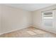 Cozy bedroom featuring natural light from window, tile floors, and neutral colors at 536 Cheshire Way, Davenport, FL 33897
