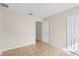 Tile-floored bedroom with neutral walls, a window, and closet space at 536 Cheshire Way, Davenport, FL 33897