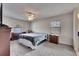 Bedroom with ceiling fan, neutral walls, and windows that provide lots of natural light at 1060 Colony Park Dr, Lakeland, FL 33813