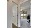 Bonus room seen from hall featuring a view of fenced backyard at 1060 Colony Park Dr, Lakeland, FL 33813