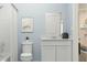 Clean bathroom with white vanity and light blue walls at 3006 Chantilly Dr, Davenport, FL 33837