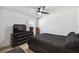 Comfortable bedroom featuring neutral walls, ceiling fan, and ample space for relaxation at 8867 Pebblebrooke Dr, Lakeland, FL 33810