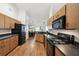 Spacious kitchen with wood cabinets and laminate counters, perfect for cooking at 8867 Pebblebrooke Dr, Lakeland, FL 33810