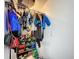 Well-organized closet with various clothes, shoes, and storage solutions at 3911 Auburndale Ave, Orlando, FL 32839