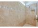 Tiled shower showcasing neutral colored walls and a modern showerhead, plus built-in niche at 5295 Sw 87Th Ter, Ocala, FL 34481