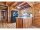 Kitchen featuring wood cabinets, granite countertops, and stainless steel appliances at 114 Tempsford Rd, Auburndale, FL 33823