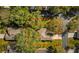 Aerial view of the home showing the layout of the property, landscaping, and surrounding neighborhood at 2450 Shelby Ln, Clermont, FL 34711