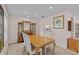 Formal dining room features a beautiful wooden table, decorative chairs, and an elegant china cabinet at 2450 Shelby Ln, Clermont, FL 34711