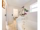 Bathroom boasting a bathtub, view to walk in closet and modern fixtures at 331 Marquee Dr, Kissimmee, FL 34758