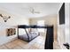 Bedroom featuring a bunk bed with slide, ceiling fan, and a window at 331 Marquee Dr, Kissimmee, FL 34758