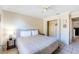 Bright bedroom features a closet, ceiling fan, window and neutral walls at 331 Marquee Dr, Kissimmee, FL 34758