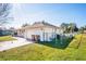 The property features a fenced yard and a two-car garage, offering security and ample parking space at 331 Marquee Dr, Kissimmee, FL 34758