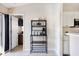 Eat-in kitchen features a coffee bar with shelving and white cabinets at 331 Marquee Dr, Kissimmee, FL 34758