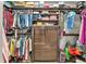 Organized walk-in closet with custom shelving and wooden drawers for optimal storage at 506 Parrott Rd, Auburndale, FL 33823