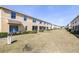 Exterior view of home with back patio and lush, green backyard at 5409 Limestone Ln, Lakeland, FL 33809