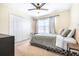 Bedroom featuring a large closet, ceiling fan and natural lighting at 5409 Limestone Ln, Lakeland, FL 33809