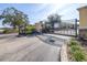 Gated community entrance featuring stone accents and lush landscaping at 5409 Limestone Ln, Lakeland, FL 33809