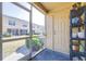 Enclosed patio with a view of an exterior apartment complex at 5409 Limestone Ln, Lakeland, FL 33809