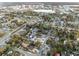 Real estate aerial view capturing a quaint neighborhood featuring lush, mature trees at 833 Texas Ave, Lakeland, FL 33815