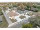 A high angle shot showcasing neighboring homes and well-maintained, green lawns at 835 Texas Ave, Lakeland, FL 33815