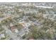 Scenic aerial perspective showing properties in a well established neighborhood with mature trees at 835 Texas Ave, Lakeland, FL 33815