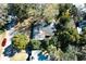 Aerial view of the property showing the home's layout, surrounding trees, and the neighborhood at 922 Se 13Th St, Ocala, FL 34471