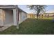 Side view of the backyard with lake view at 1907 Eliza Ann St, Kissimmee, FL 34758