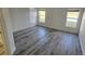 Spacious main bedroom with scenic lake views from its three large windows at 1907 Eliza Ann St, Kissimmee, FL 34758