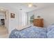 Well lit and spacious bedroom featuring a window view and closet at 4101 Poinciana Dr, Indian Lake Estates, FL 33855