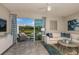 Inviting living room featuring water view, modern furnishings, and natural light at 2513 Penguin Blvd, Davenport, FL 33837