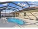 Sparkling pool within screened enclosure features a spacious patio with outdoor lounging at 1713 Altavista Cir, Lakeland, FL 33810