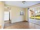 Bright dining room with sliding glass door to backyard at 6317 Georgia Ave, Lakeland, FL 33813