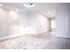 Bright living room features recessed lighting, a modern ceiling fan, and a decorative area rug on wood-look floors at 1231 Sidcup Rd, Maitland, FL 32751