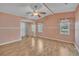 Cozy bedroom featuring a spacious closet, natural light, and comfortable flooring at 1612 Cog Hill Dr, Lady Lake, FL 32159