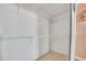 Empty walk-in closet with wire shelving for organized storage at 1612 Cog Hill Dr, Lady Lake, FL 32159