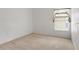 Bedroom with neutral carpet, window with curtains, and blank canvas at 131 Vine Dr, Davenport, FL 33837