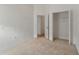 Bedroom with walk-in closet and carpet flooring at 131 Vine Dr, Davenport, FL 33837