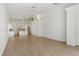 Spacious living room featuring tile floors and an open floor plan to the kitchen at 131 Vine Dr, Davenport, FL 33837