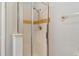 Shower stall featuring glass doors, tiled walls, and chrome shower fixtures at 131 Vine Dr, Davenport, FL 33837