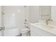 Bathroom features a shower/tub combination and a vanity with a single sink at 2304 Depauw Ave, Orlando, FL 32804
