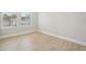 Bright bedroom with two windows, offering a clean and minimalist design at 2304 Depauw Ave, Orlando, FL 32804