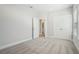 Neutral bedroom with plush carpeting, closet, and an ensuite bathroom for added convenience at 2304 Depauw Ave, Orlando, FL 32804