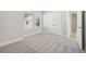 Bedroom featuring soft carpet and natural light from the large windows at 2304 Depauw Ave, Orlando, FL 32804